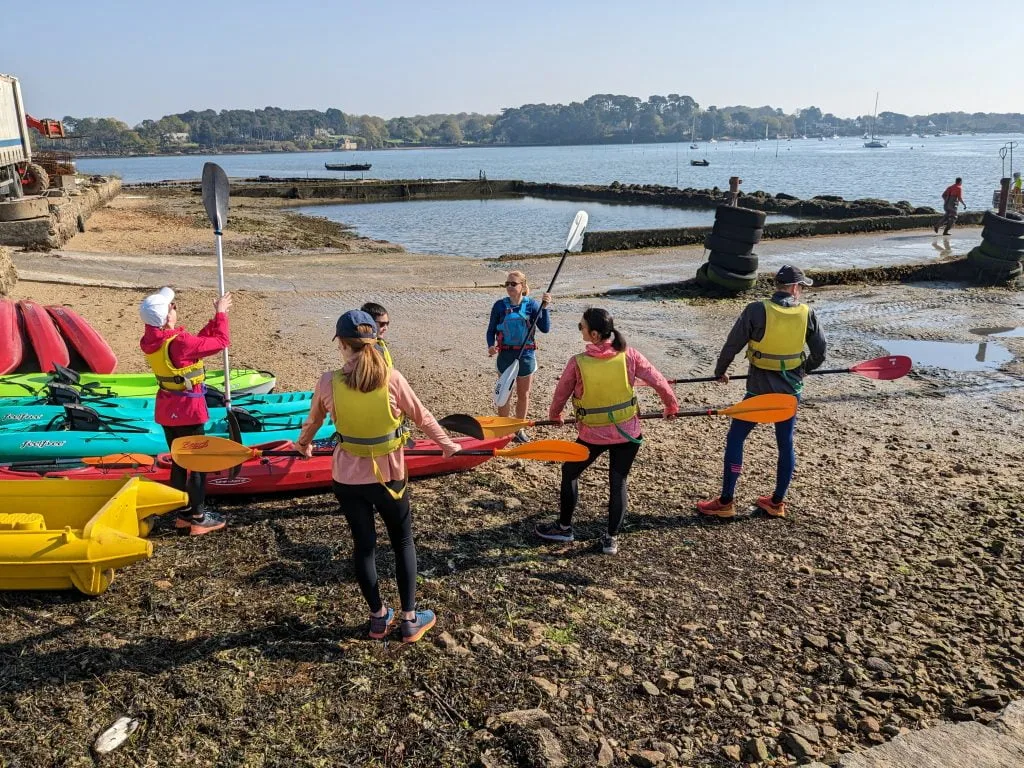 Briefing on the beach before heading out for kayaking.