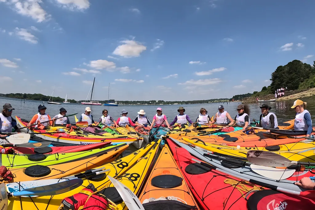 Grouping of colorful sea kayaks.
