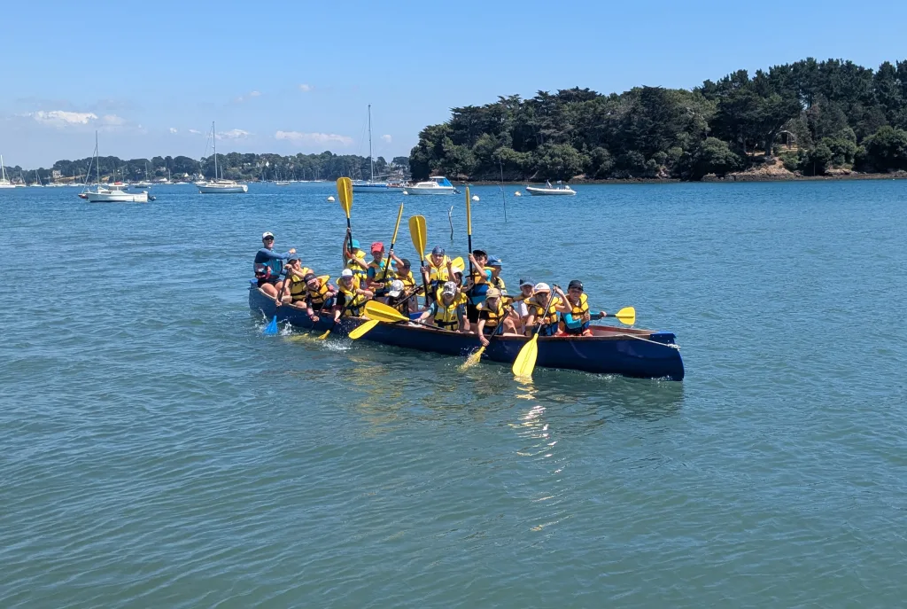 Group of children in a Canobus in the Gulf of Morbihan.